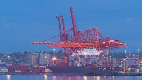 Sinopec ship at port with large cargo and cranes